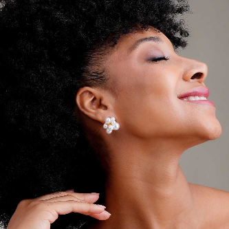 Model wearing Cluster Pearl Earrings