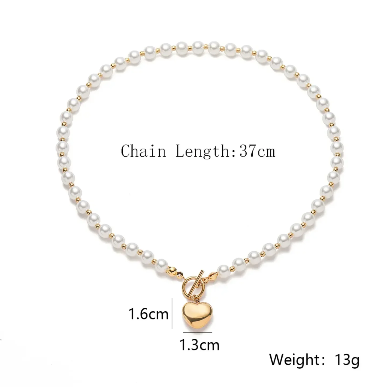 Golden Heart Pearl Necklace Studio Shot – Modern Luxury Jewelry