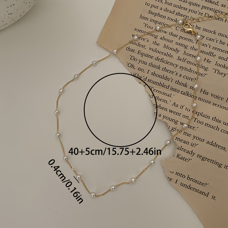 Editorial minimal shot of the Pearl Radiance Strand necklace