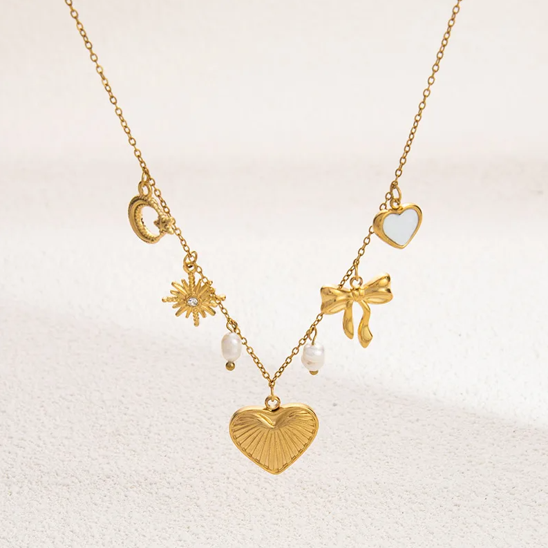 Heart bow charm necklace