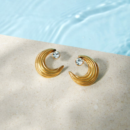 Crescent studs