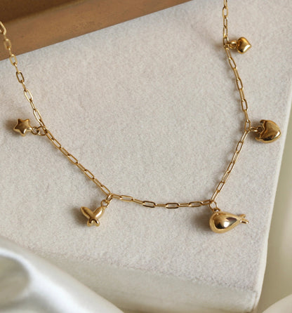 Gold whale mini charm necklace