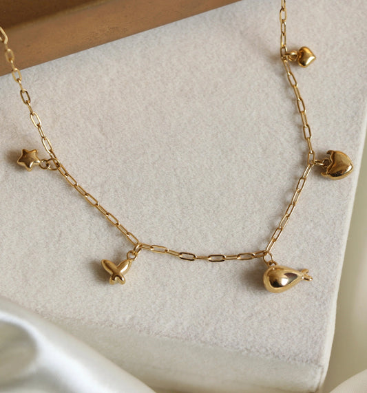 Gold whale mini charm necklace