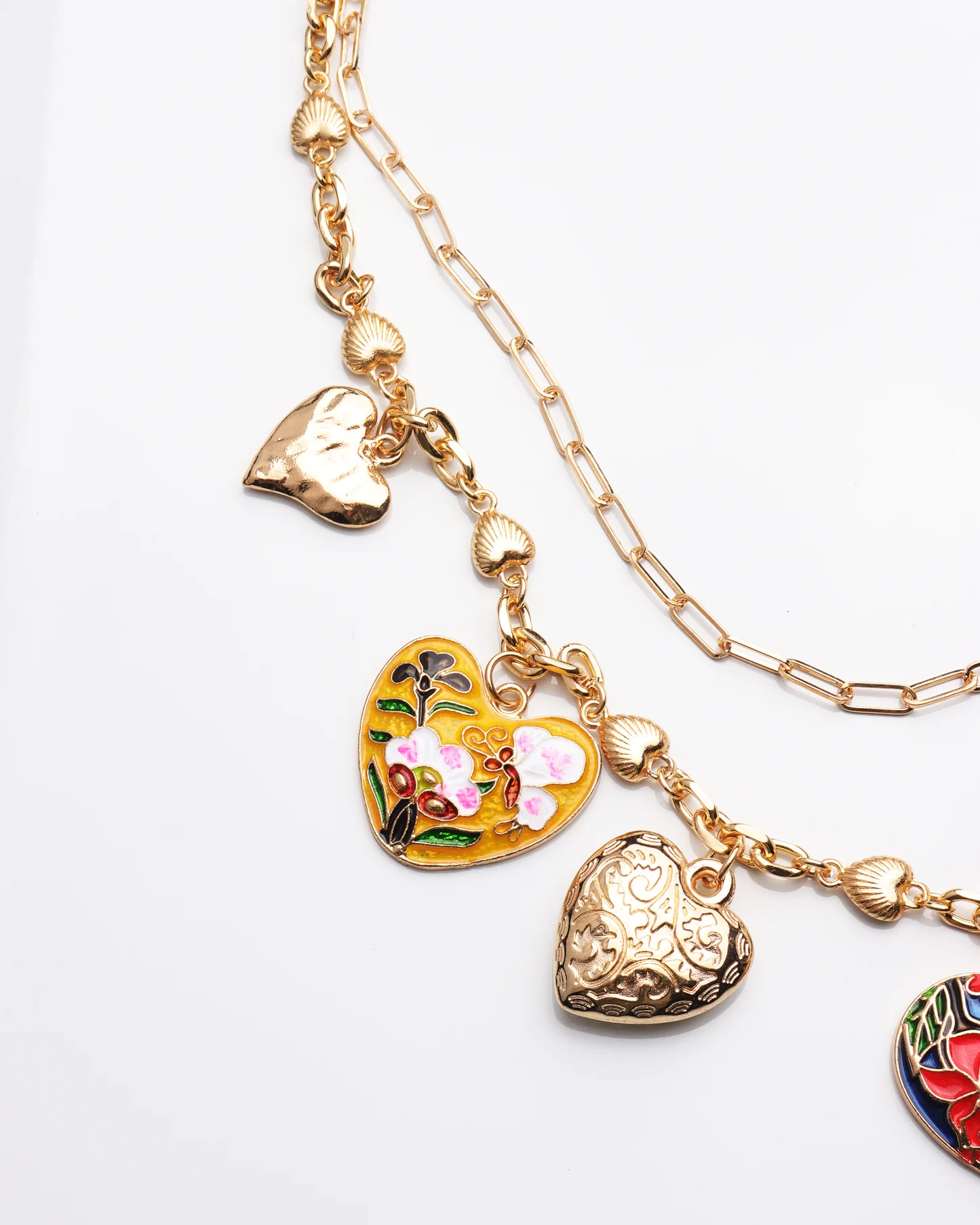 Multi layered heart charm necklace