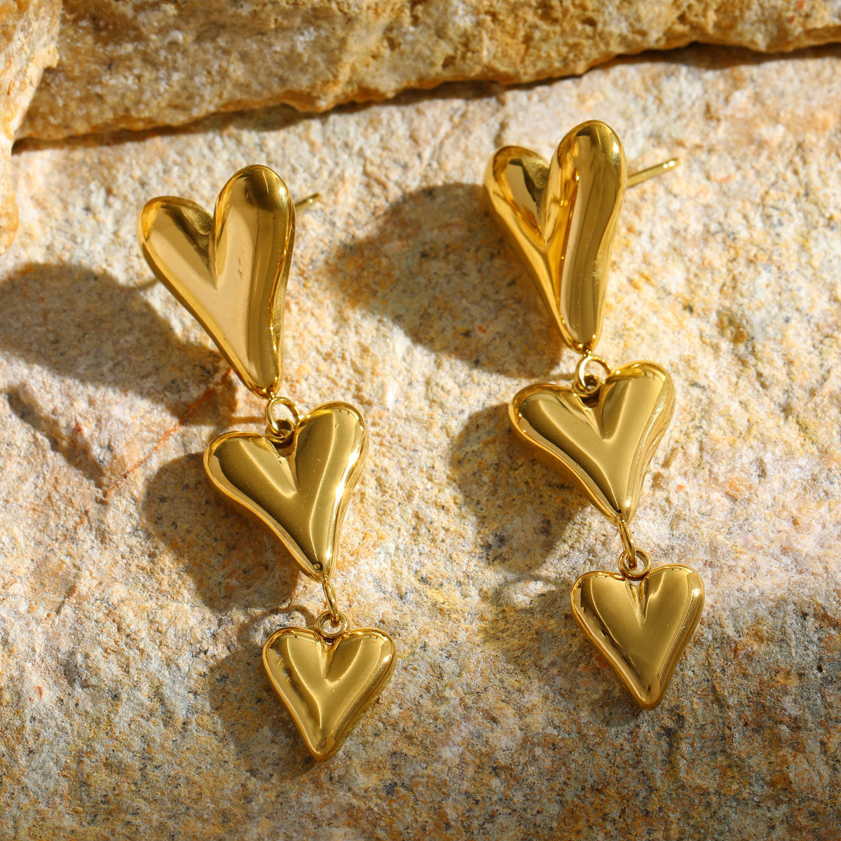 Triple charm heart earrings