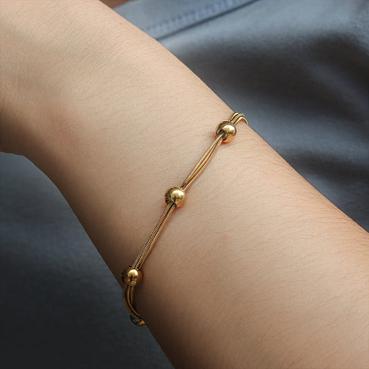 Three chain ball bracelet
