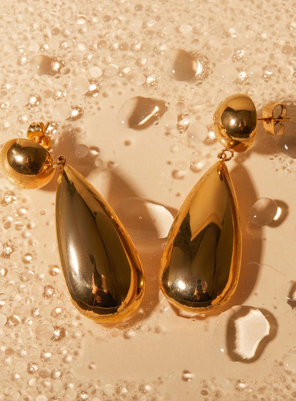 Modern gold droplet earrings side angle