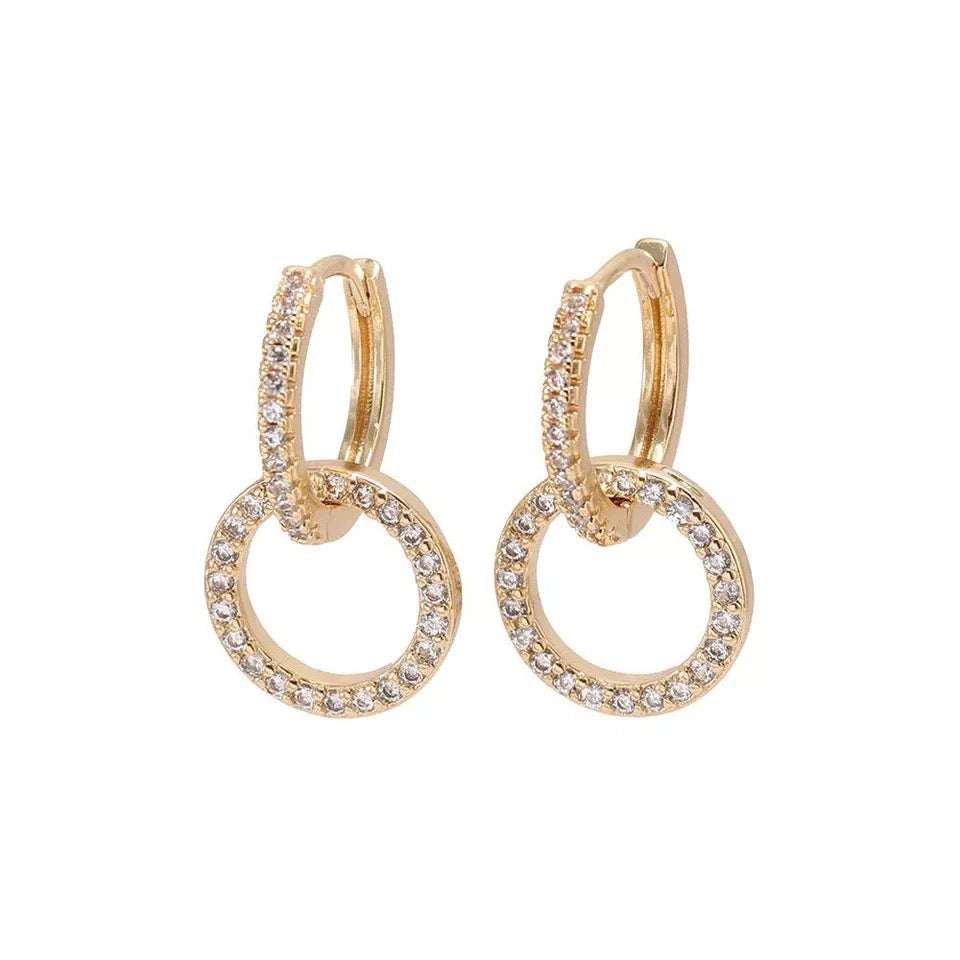 Close-up detailing of Infinity Glow Earrings