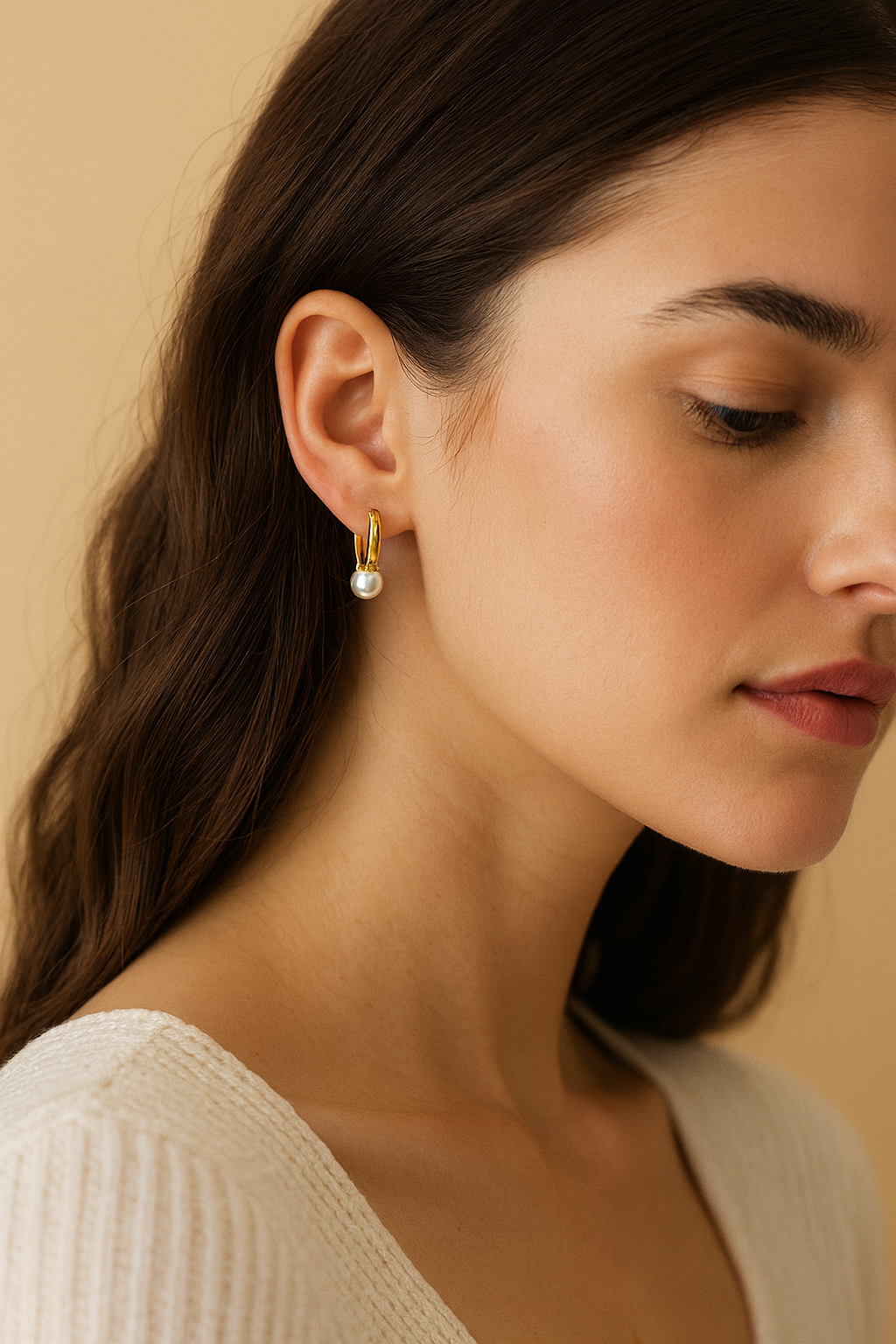Gold huggie earrings with small pearls side profile