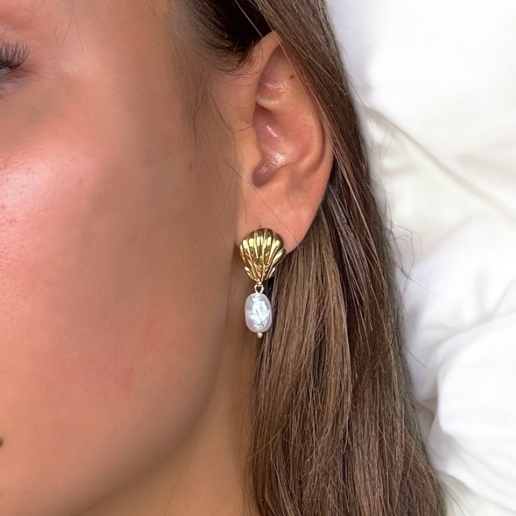 Side angle of Ocean Pearl Earrings with polished finish